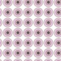 Seamless vector pattern consisting of pink and brown color circular elements